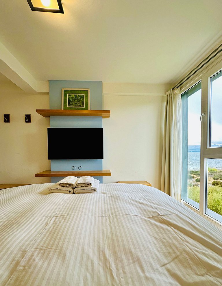 Apartamento boutique com vista para o lago, garagem, piscina