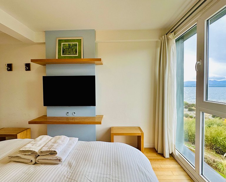 Apartamento boutique com vista para o lago, garagem, piscina