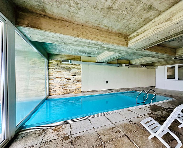 Apartamento boutique com vista para o lago, garagem, piscina